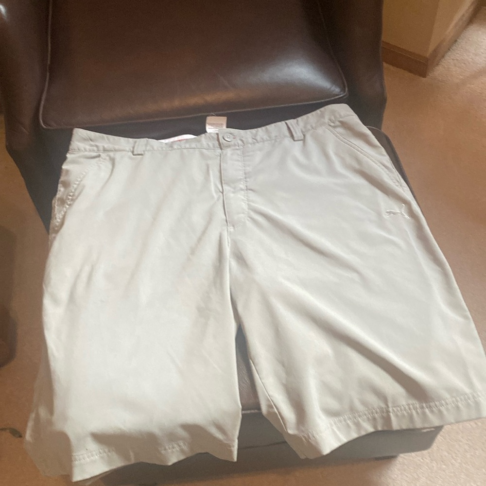 Mens grey Puma shorts with pockets front and back